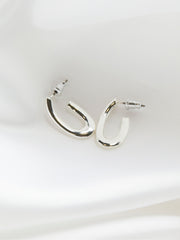 Silver Tone Twist Oval Hoop Earrings