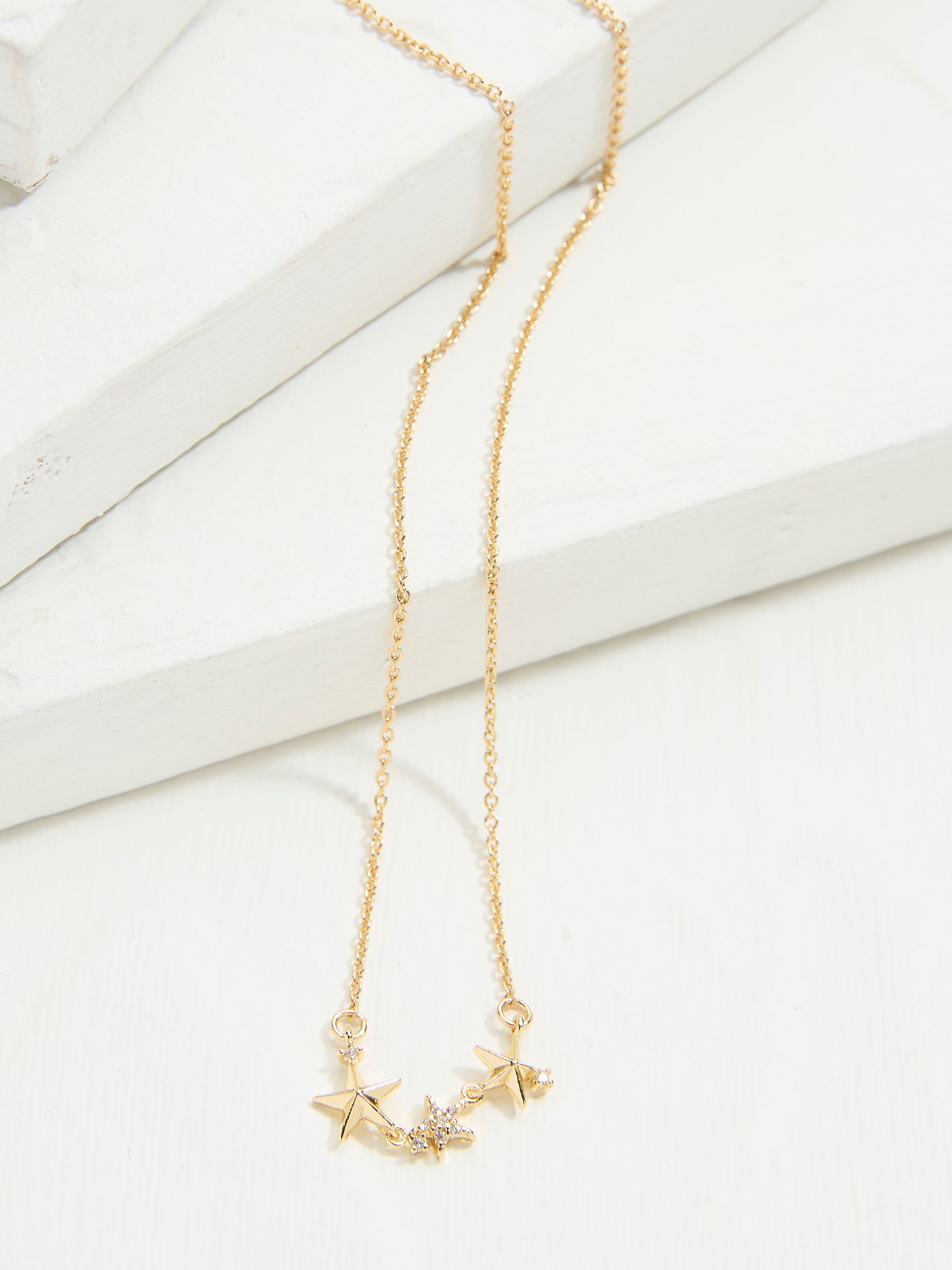 Gold Tone Trio Star Pendant Necklace