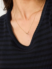 Gold Tone Bow Pendant Necklace