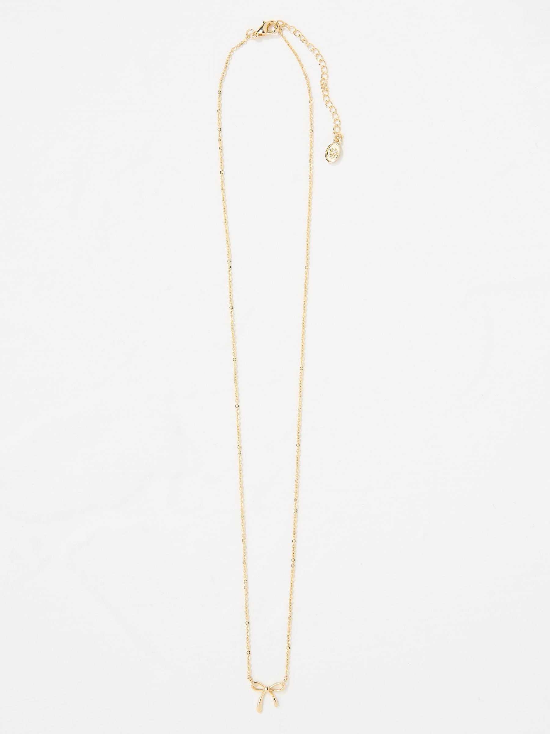 Gold Tone Bow Pendant Necklace