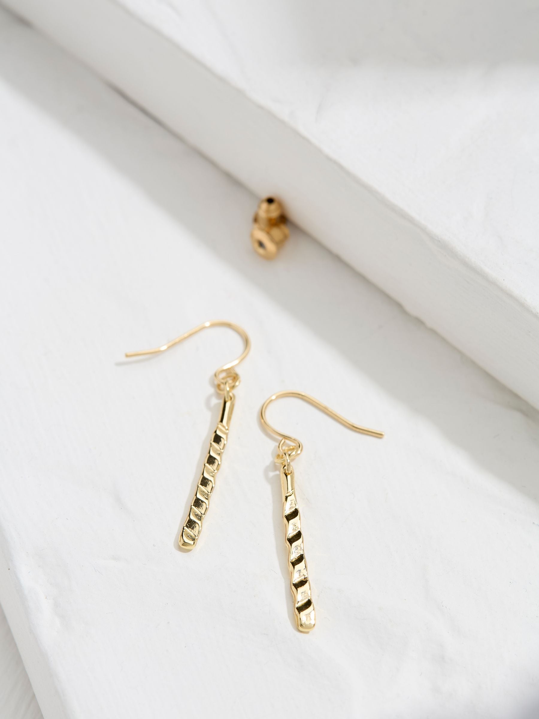 Gold Tone Twist Bar Drop Earrings