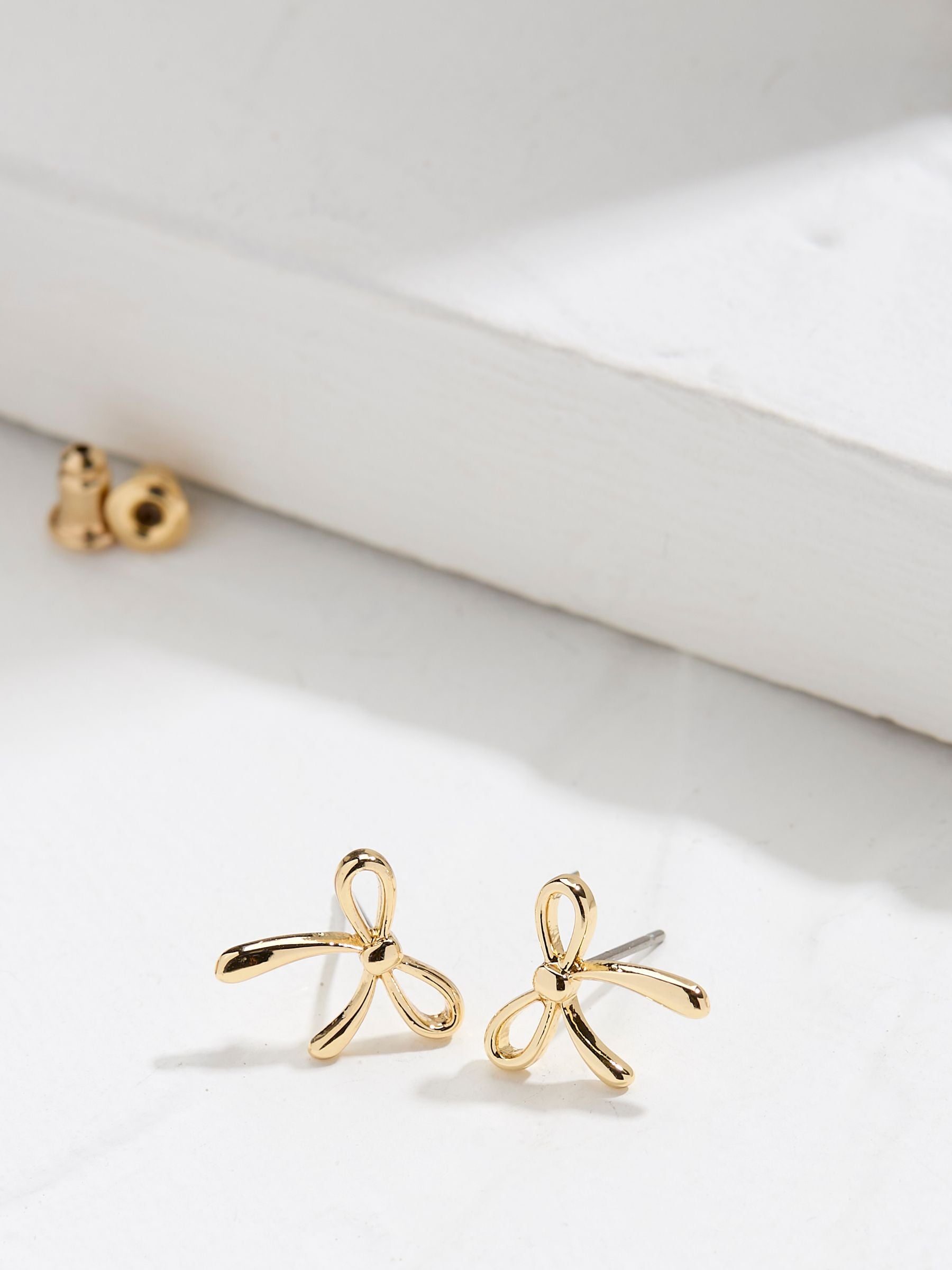 Gold Tone Bow Stud Earrings