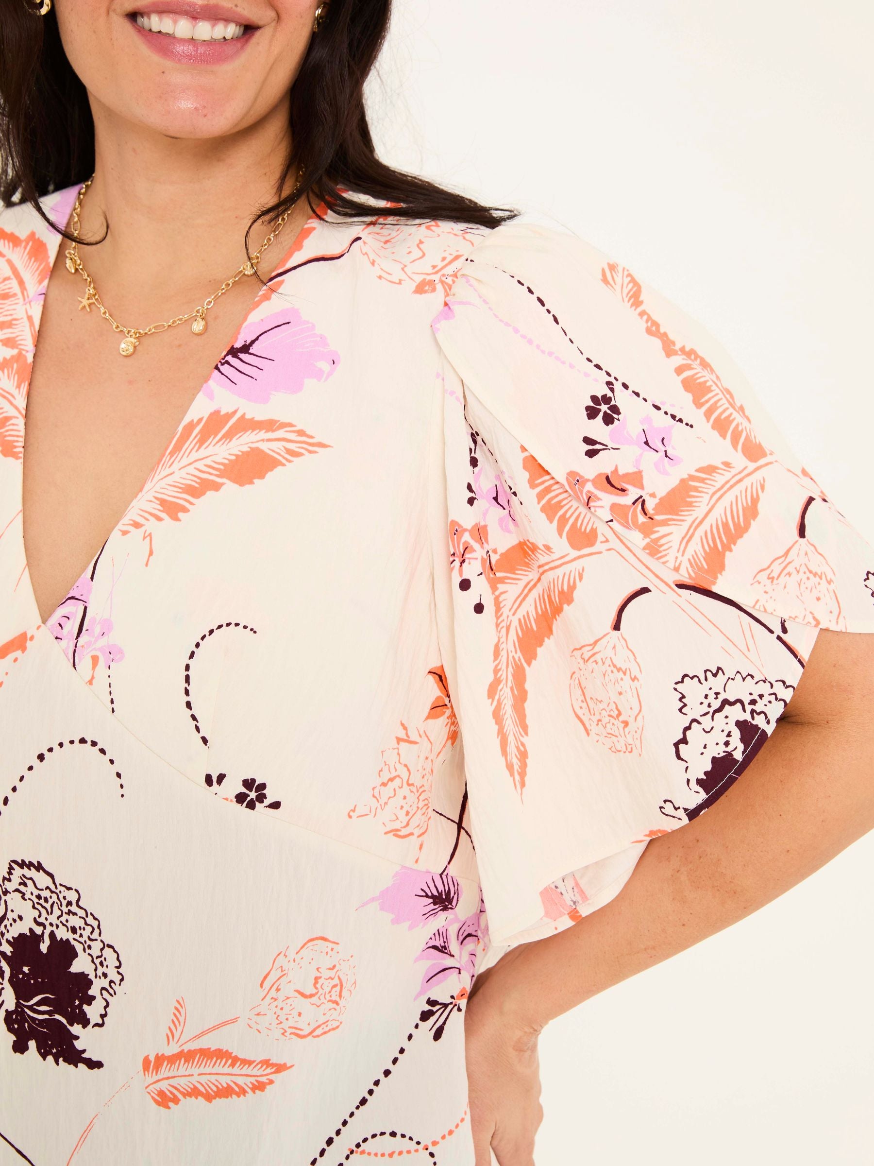 Isla Ivory Flute Sleeve Top