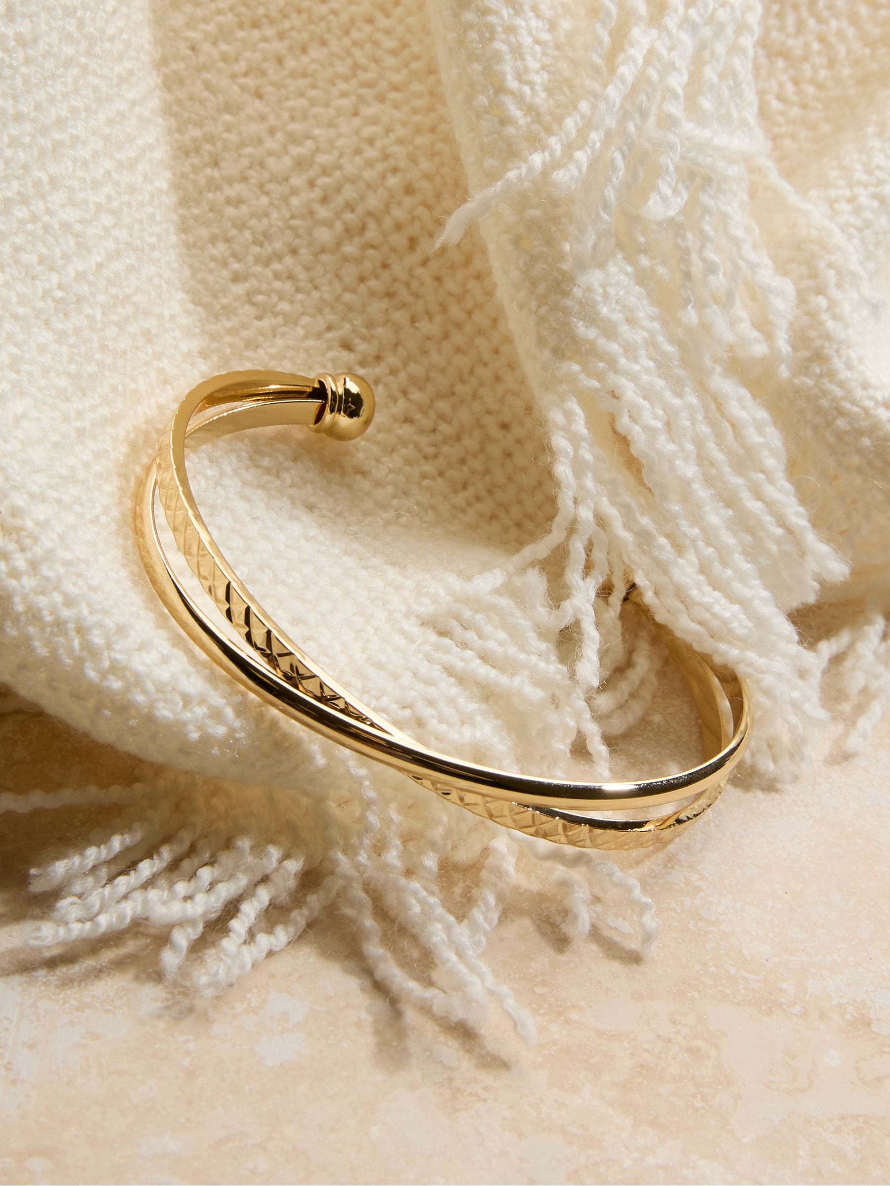 Gold Coloured Twist Detail Bangle