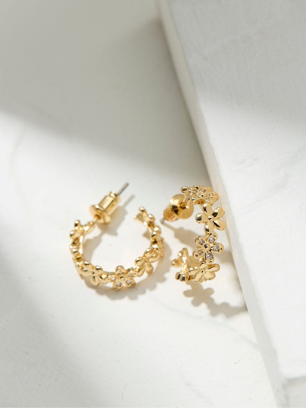Daisy Gold Tone Hoops Earrings