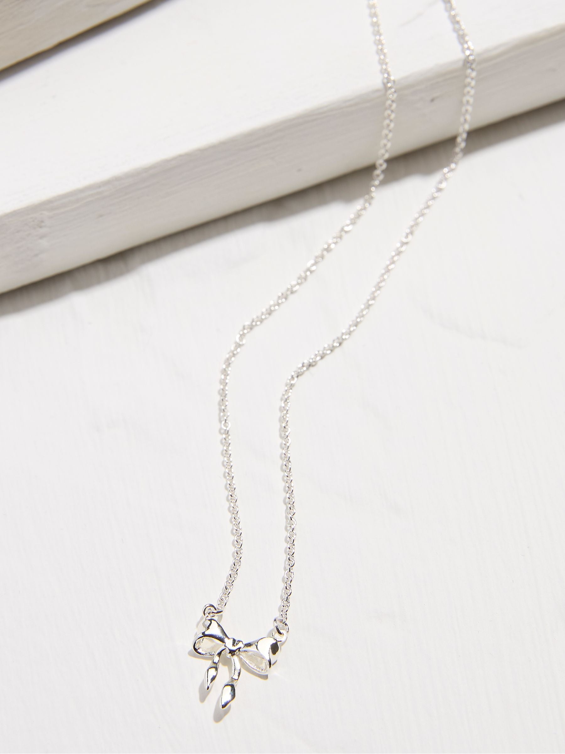 Silver Tone Bow Necklace