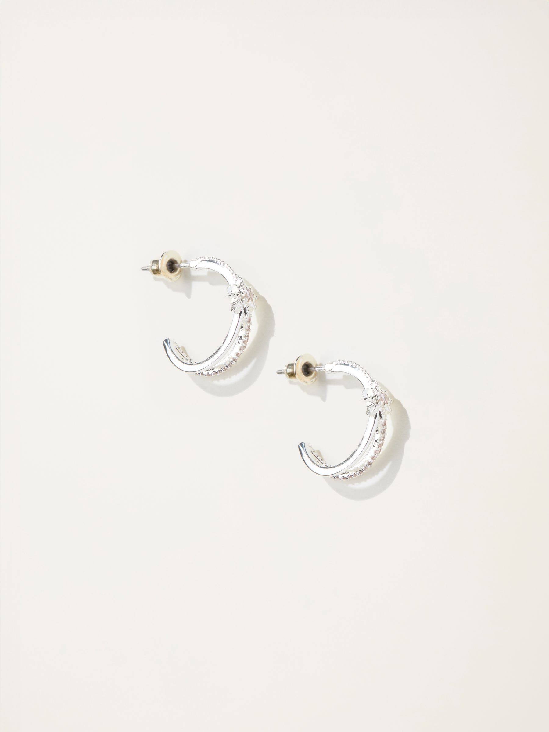 Silver Tone Star Huggie Earrings