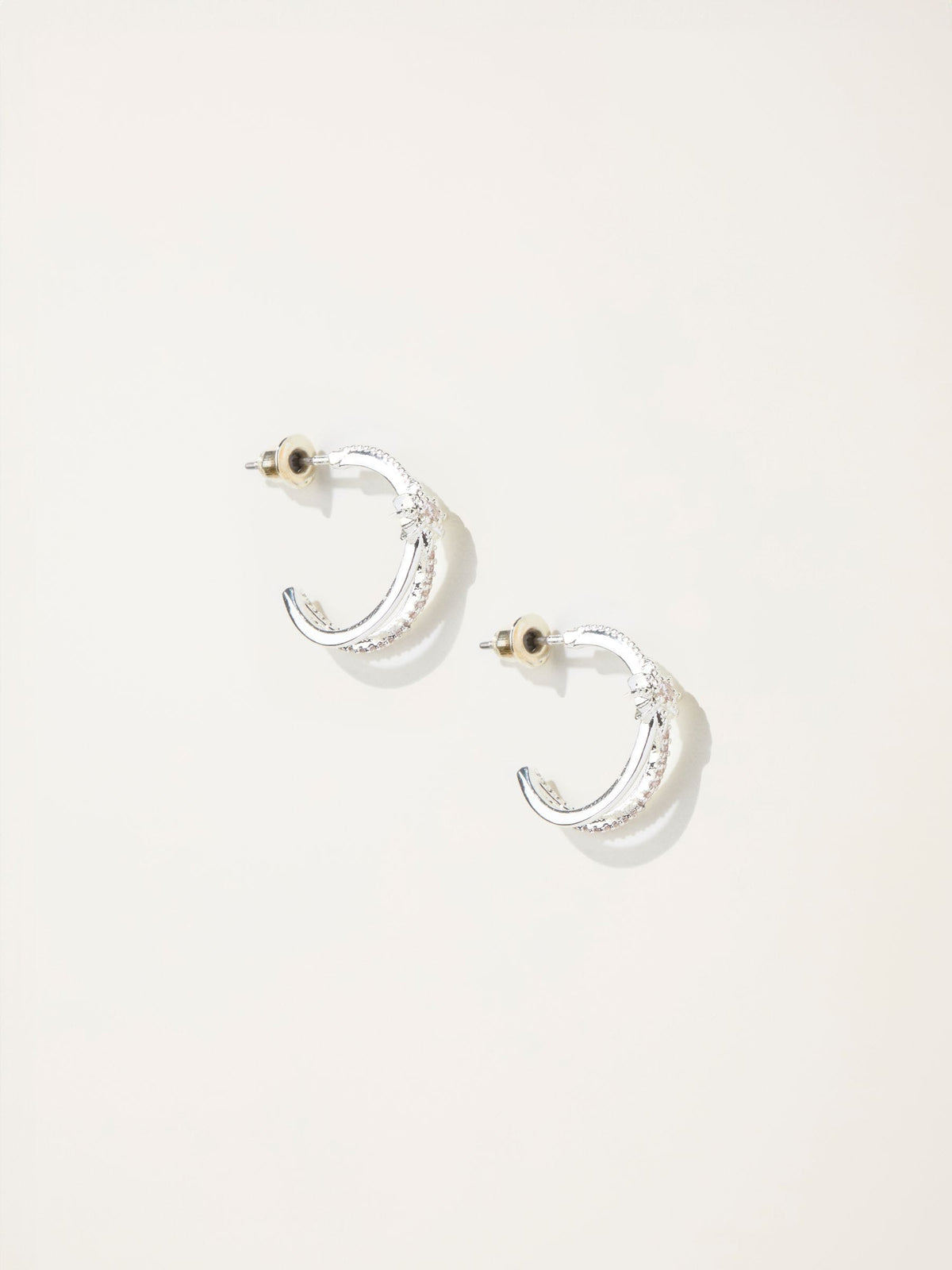 Silver Tone Star Huggie Earrings