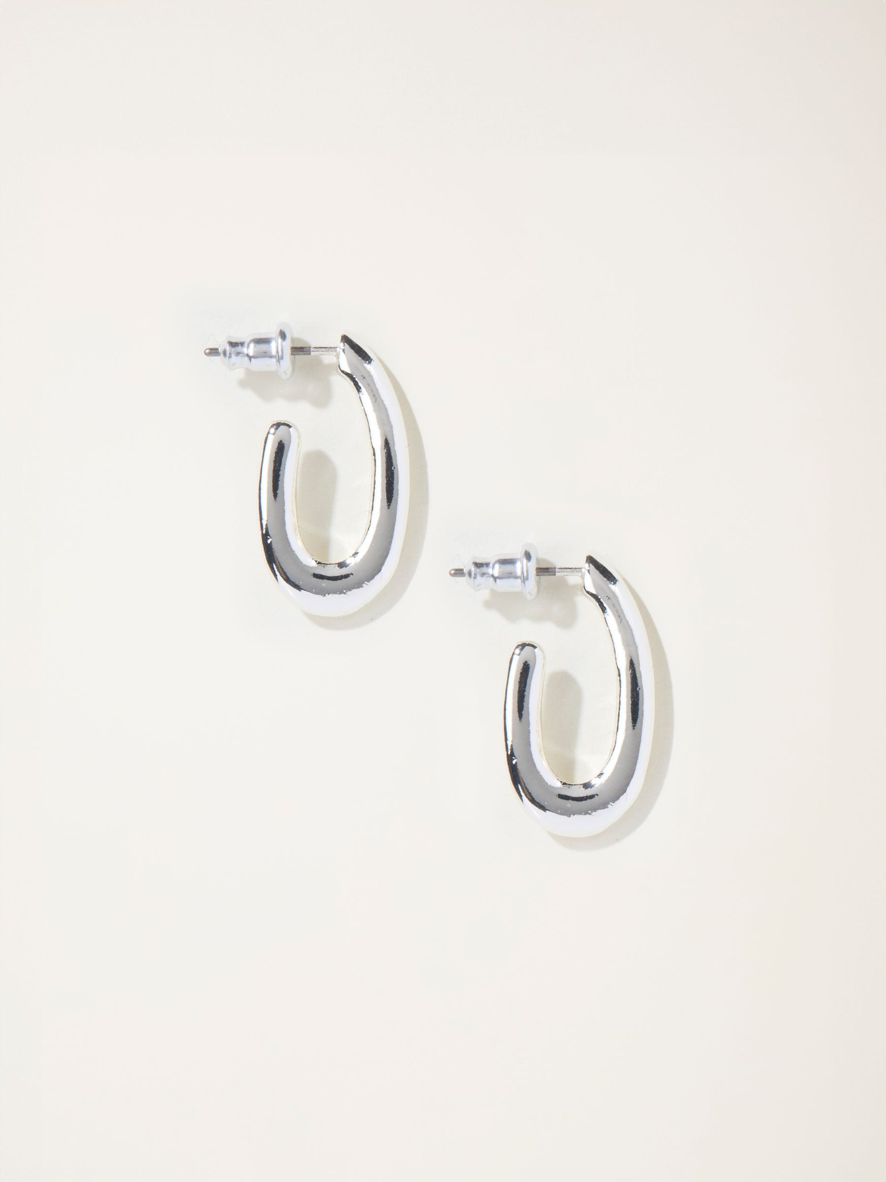 Silver Tone Twist Oval Hoop Earrings