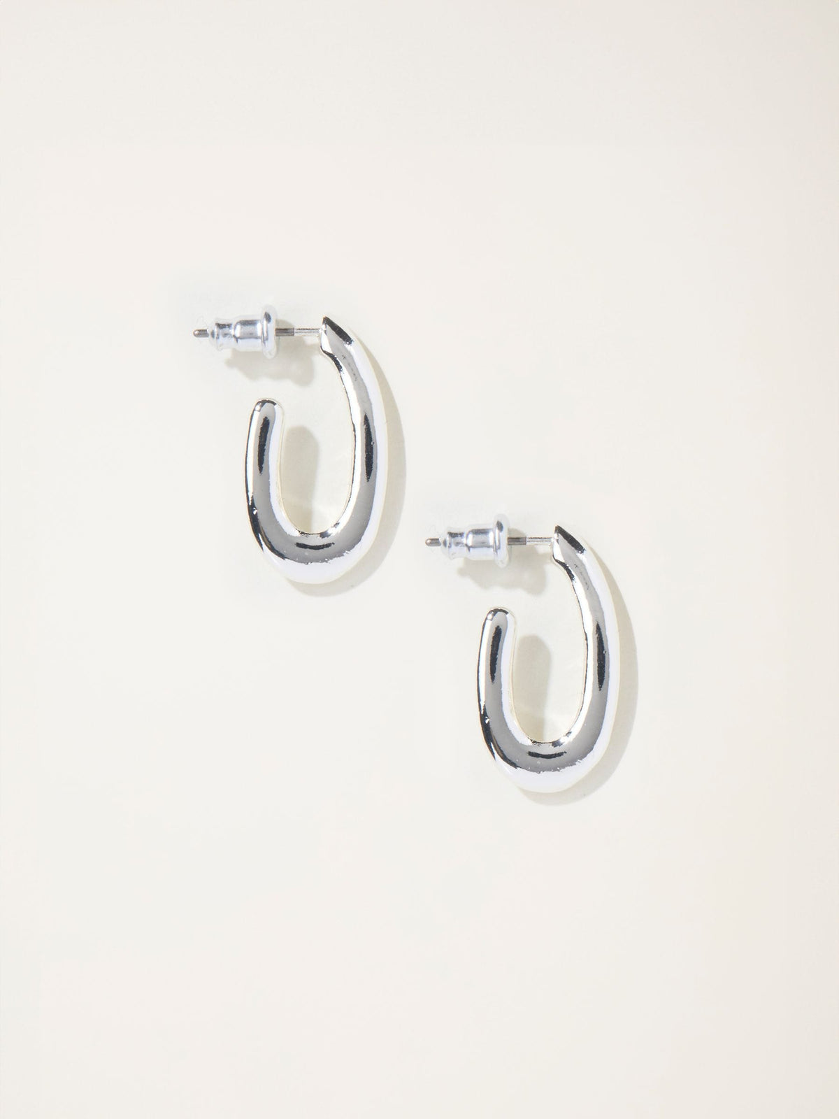Silver Tone Twist Oval Hoop Earrings