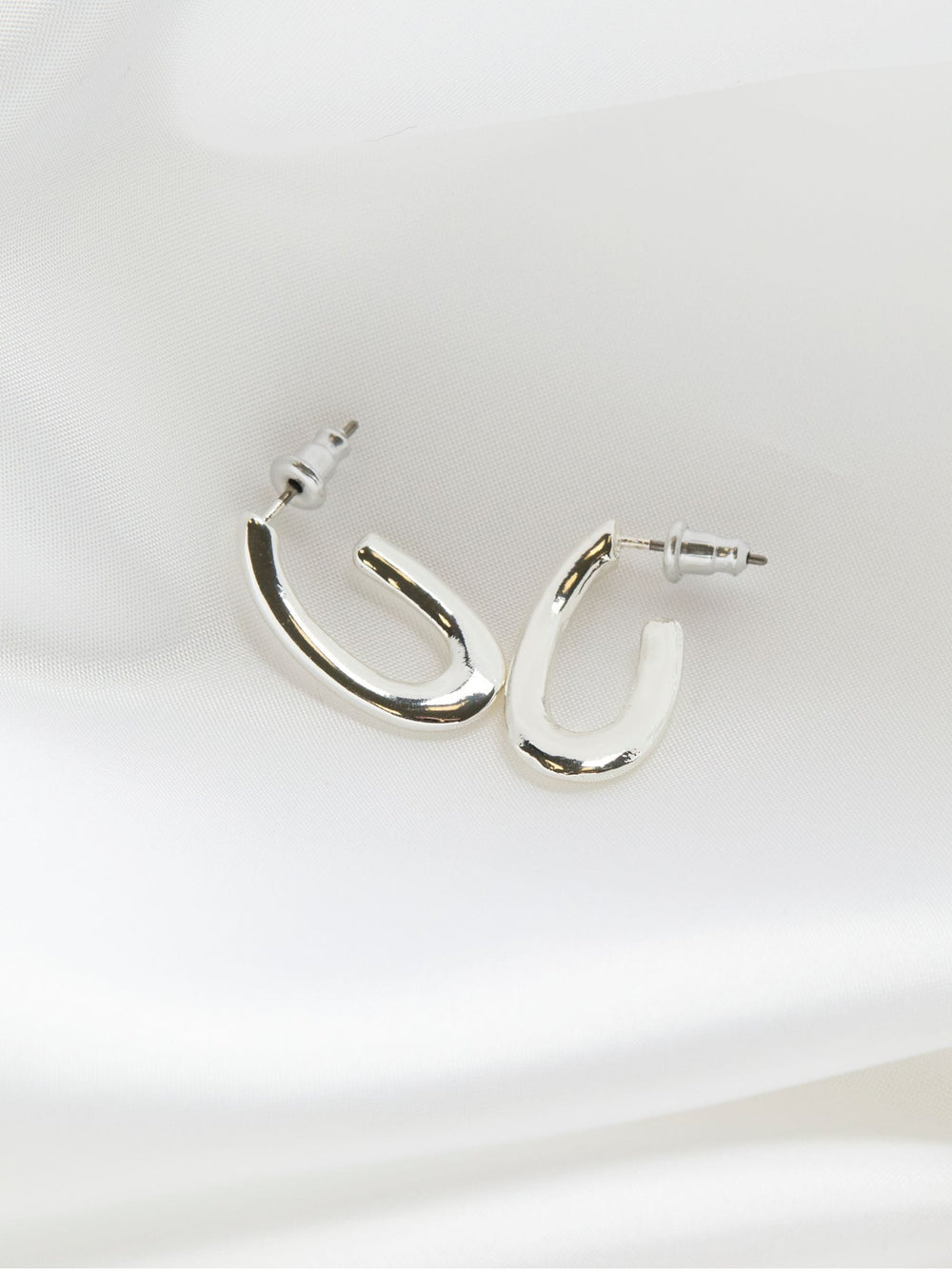 Silver Tone Twist Oval Hoop Earrings