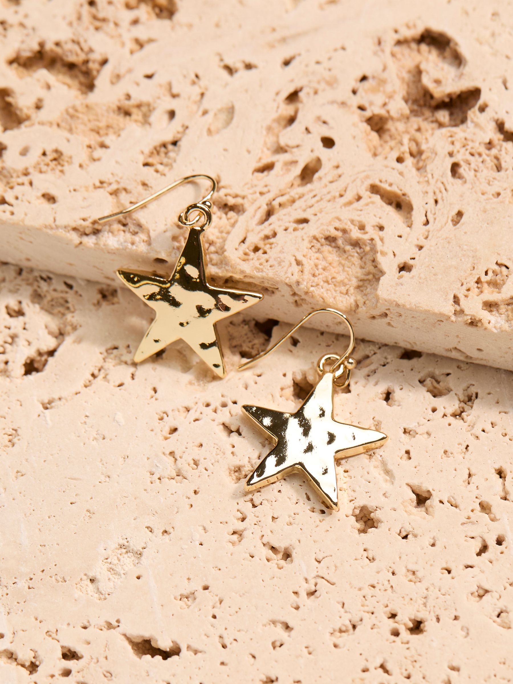 Gold Tone Large Star Drop Earrings