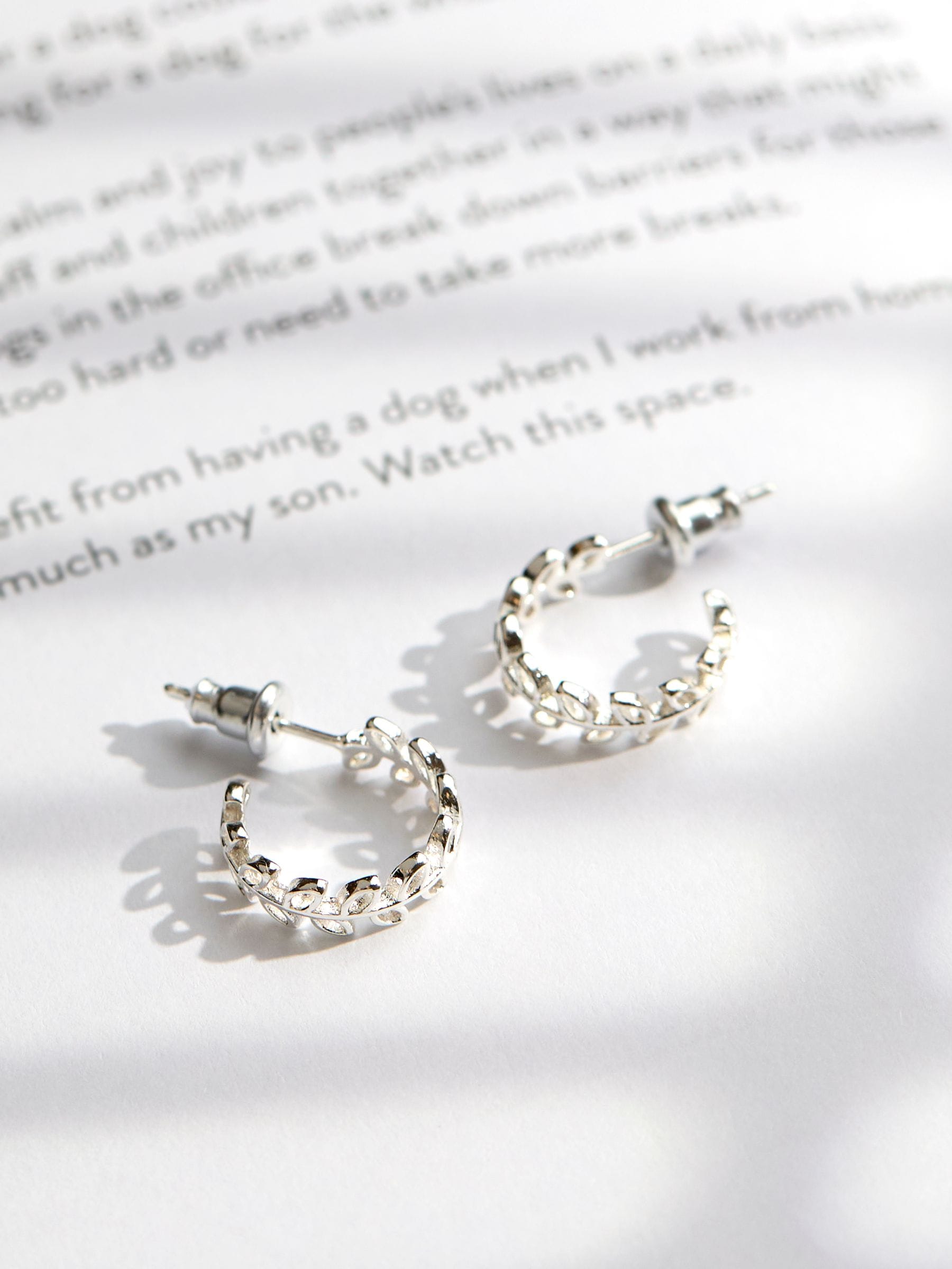 Silver Tone Leaf Huggie Earrings
