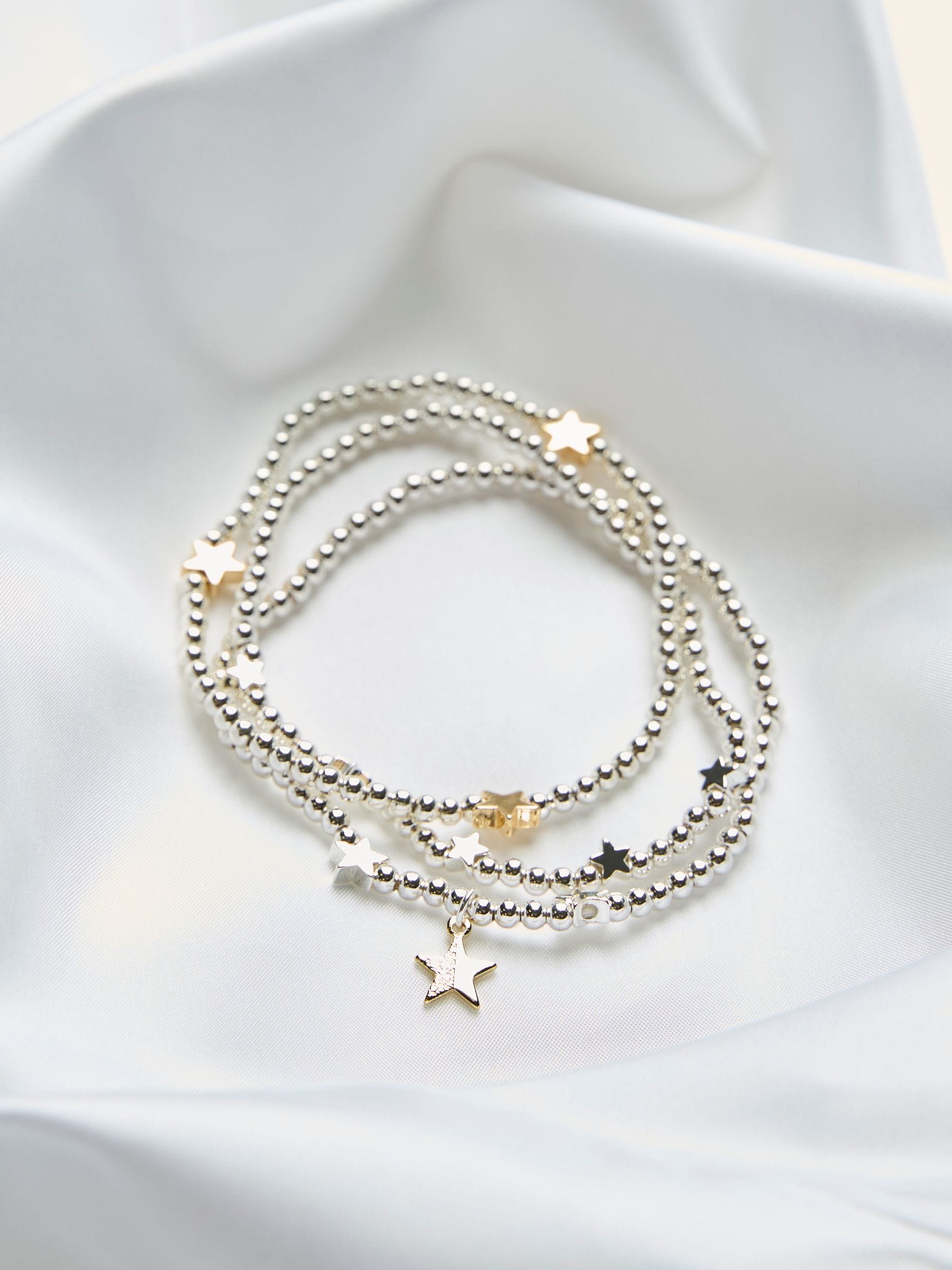 Silver Tone Trio Star Stretch Bracelet