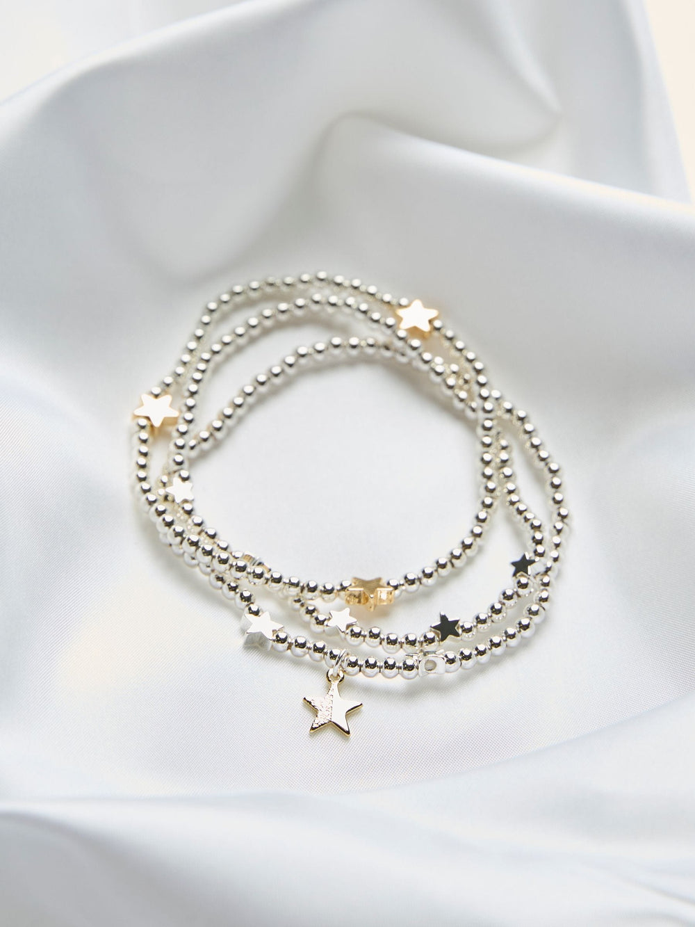 Silver Tone Trio Star Stretch Bracelet
